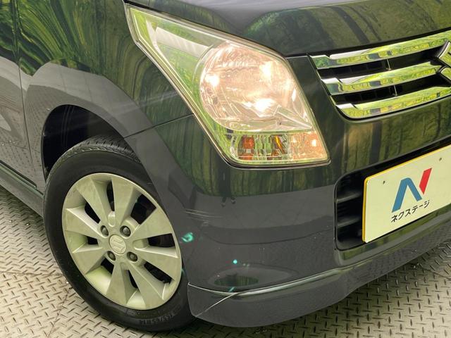 ワゴンR FXリミテッドII 禁煙車 オートエアコン スマートキー シートアンダートレイ アームレスト 純正14インチアルミホイール 純正革巻きステアリングホイール 電動格納ミラー(12枚目)