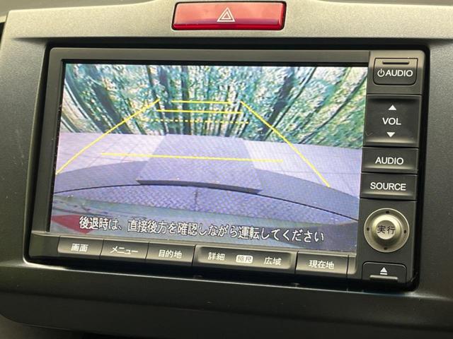 フリード G エアロ ジャストセレクション 電動スライドドア 純正ナビ バックカメラ 禁煙車 HIDヘッド ETC オートライト オートエアコン 16インチアルミ CD DVD再生 地デジ ドアバイザー プライバシーガラス(5枚目)