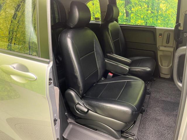 フリード G エアロ ジャストセレクション 電動スライドドア 純正ナビ バックカメラ 禁煙車 HIDヘッド ETC オートライト オートエアコン 16インチアルミ CD DVD再生 地デジ ドアバイザー プライバシーガラス(9枚目)