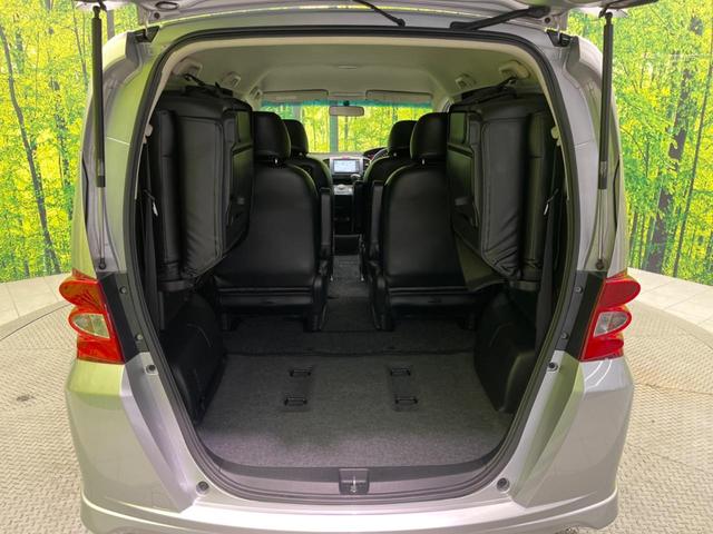 フリード G エアロ ジャストセレクション 電動スライドドア 純正ナビ バックカメラ 禁煙車 HIDヘッド ETC オートライト オートエアコン 16インチアルミ CD DVD再生 地デジ ドアバイザー プライバシーガラス(11枚目)