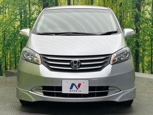 フリード G エアロ ジャストセレクション 電動スライドドア 純正ナビ バックカメラ 禁煙車 HIDヘッド ETC オートライト オートエアコン 16インチアルミ CD DVD再生 地デジ ドアバイザー プライバシーガラス(15枚目)