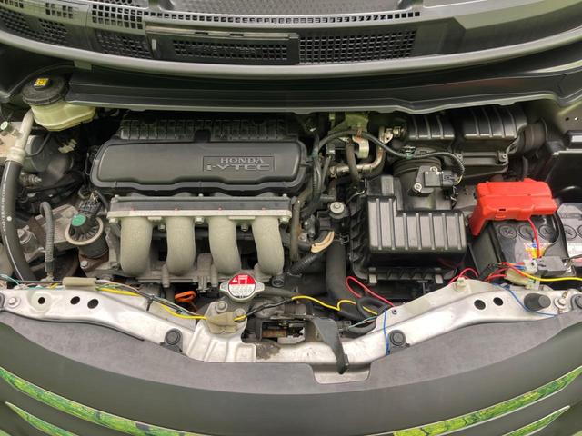 フリード G エアロ ジャストセレクション 電動スライドドア 純正ナビ バックカメラ 禁煙車 HIDヘッド ETC オートライト オートエアコン 16インチアルミ CD DVD再生 地デジ ドアバイザー プライバシーガラス(19枚目)