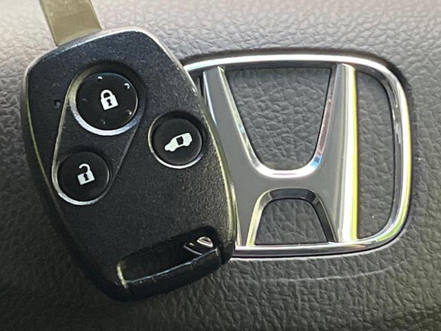 フリード G エアロ ジャストセレクション 電動スライドドア 純正ナビ バックカメラ 禁煙車 HIDヘッド ETC オートライト オートエアコン 16インチアルミ CD DVD再生 地デジ ドアバイザー プライバシーガラス(40枚目)