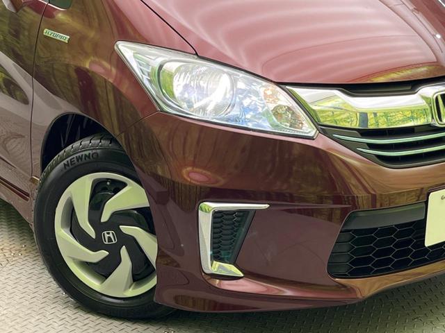 フリードハイブリッド ハイブリッド 電動スライドドア 禁煙車 HIDヘッド ETC オートライト オートエアコン CD(13枚目)