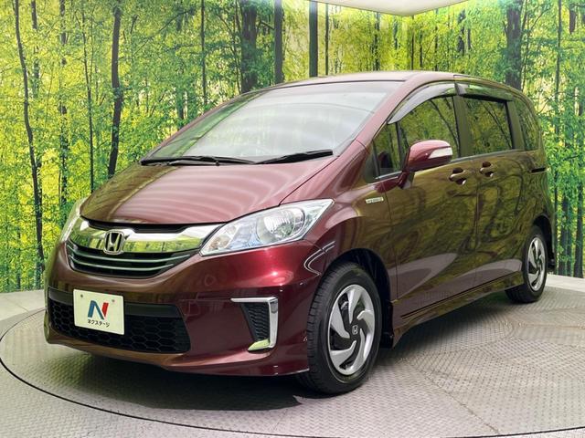 フリードハイブリッド ハイブリッド 電動スライドドア 禁煙車 HIDヘッド ETC オートライト オートエアコン CD(24枚目)