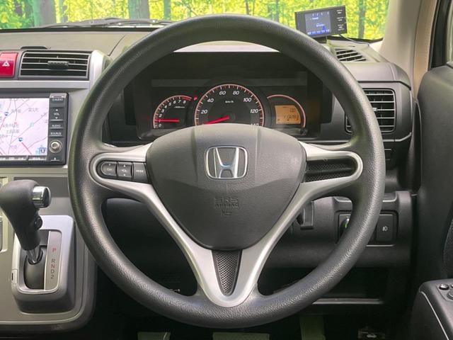 ゼストスパーク W 禁煙車 純正インターナビシステム バックカメラ HIDヘッドライト オートエアコン スマートキー 純正14インチアルミホイール ETC 電動格納ミラー プライバシーガラス(11枚目)