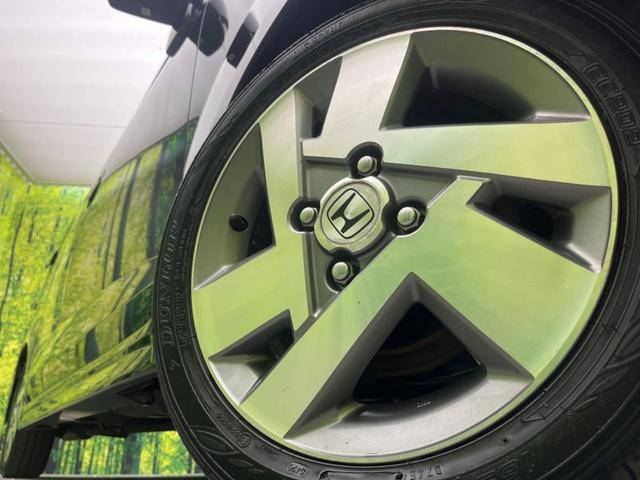 ゼストスパーク W 禁煙車 純正インターナビシステム バックカメラ HIDヘッドライト オートエアコン スマートキー 純正14インチアルミホイール ETC 電動格納ミラー プライバシーガラス(13枚目)