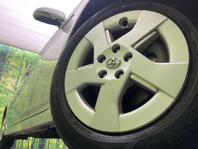 プリウス Ｌ　禁煙車　純正ナビ　スマートキー　電動格納ミラー　オートエアコン　純正１５インチアルミホイール　ステアリングスイッチ　電動格納ミラー　地デジ　ヘッドライトレベライザー（13枚目）