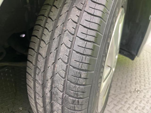 プリウス Ｌ　禁煙車　純正ナビ　スマートキー　電動格納ミラー　オートエアコン　純正１５インチアルミホイール　ステアリングスイッチ　電動格納ミラー　地デジ　ヘッドライトレベライザー（35枚目）