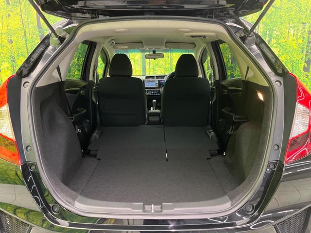 フィット 13G・Fパッケージ ファインエディション 禁煙車 純正ナビ バックカメラ ETC スマートキー オートエアコン アイドリングストップ 電動格納ミラー アームレスト 14インチアルミホイール(10枚目)