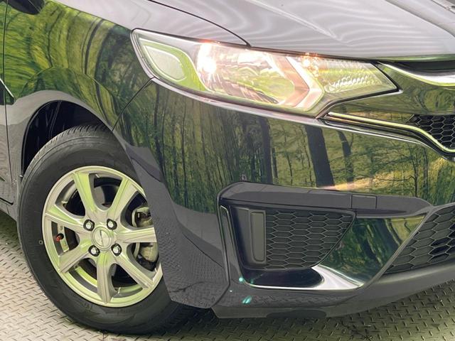 フィット 13G・Fパッケージ ファインエディション 禁煙車 純正ナビ バックカメラ ETC スマートキー オートエアコン アイドリングストップ 電動格納ミラー アームレスト 14インチアルミホイール(12枚目)
