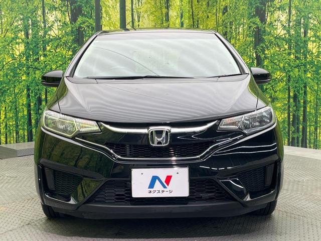 フィット 13G・Fパッケージ ファインエディション 禁煙車 純正ナビ バックカメラ ETC スマートキー オートエアコン アイドリングストップ 電動格納ミラー アームレスト 14インチアルミホイール(14枚目)