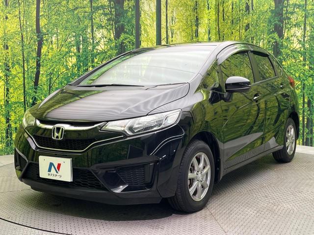 フィット 13G・Fパッケージ ファインエディション 禁煙車 純正ナビ バックカメラ ETC スマートキー オートエアコン アイドリングストップ 電動格納ミラー アームレスト 14インチアルミホイール(23枚目)