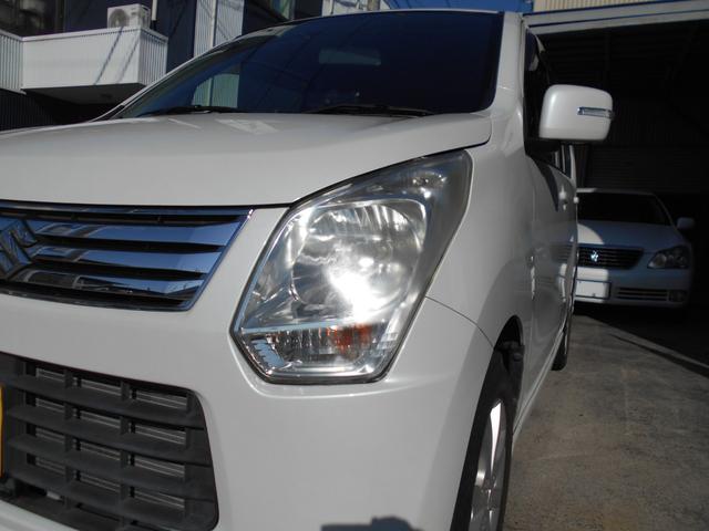 ワゴンR FXリミテッド ポータブルナビ 社外CDコンポ スマートキー オートエアコン ベンチシート 純正14インチアルミ プッシュスタート タイミングチェーン ユーザー買取車両(31枚目)