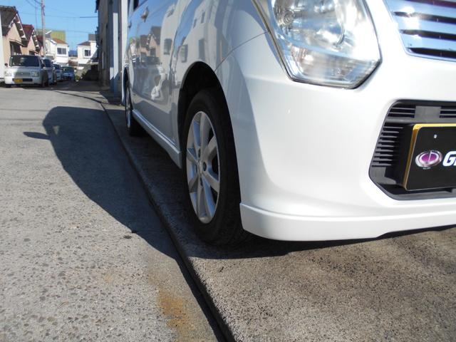 ワゴンR FXリミテッド ポータブルナビ 社外CDコンポ スマートキー オートエアコン ベンチシート 純正14インチアルミ プッシュスタート タイミングチェーン ユーザー買取車両(32枚目)