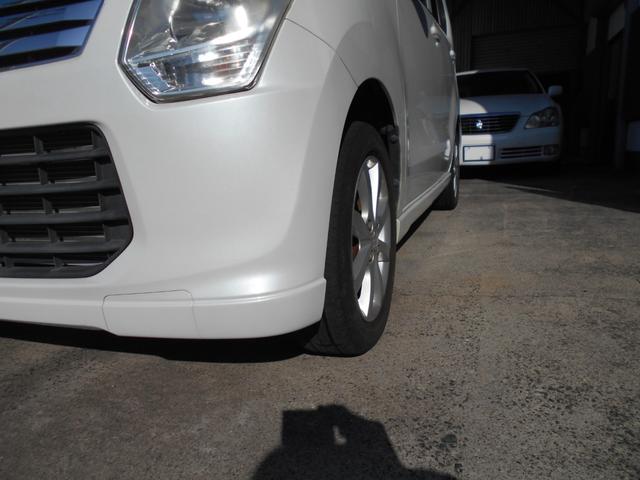 ワゴンR FXリミテッド ポータブルナビ 社外CDコンポ スマートキー オートエアコン ベンチシート 純正14インチアルミ プッシュスタート タイミングチェーン ユーザー買取車両(33枚目)