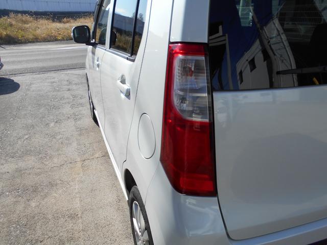 ワゴンR FXリミテッド ポータブルナビ 社外CDコンポ スマートキー オートエアコン ベンチシート 純正14インチアルミ プッシュスタート タイミングチェーン ユーザー買取車両(34枚目)