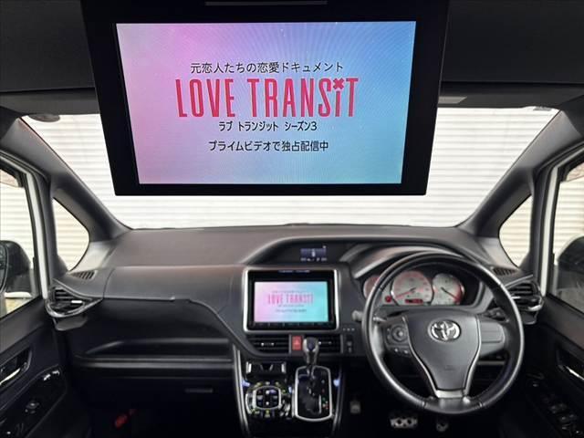 ヴォクシー ＺＳ　Ｇ’ｓ　禁煙車　９型ナビ　フリップダウン　両電スラ　フルセグ　Ｂカメラ　ＢＴ　ＥＴＣ　ＤＶＤ　Ａライト　Ａハイビーム　ＬＥＤ　Ａストップ　ハーフレザー　シートヒーター　リアスポイラー　電格ミラー　スマートキー（2枚目）