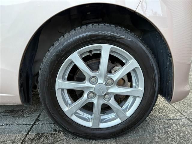 ムーヴ Xターボ SAII 車検整備付 禁煙 CDオーディオ スマートキー Aストップ ETC Pスタート Aエアコン 横滑防止 リフター アームレスト Aライト マットバイザー 集中ドアロック セキュリティ 純正14インチAW(43枚目)