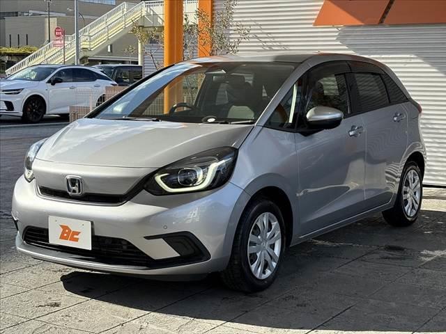 フィット ｅ：ＨＥＶベーシック　車検整備付　禁煙車　ホンダセンシング　Ｐスタート　ＬＥＤヘッド　スマートキー　クルコン　オートライト　電動パーキングブレーキ　ＥＴＣ　ＣＤオーディオ　コーナーセンサー　衝突軽減ブレーキ　フロアマット（10枚目）