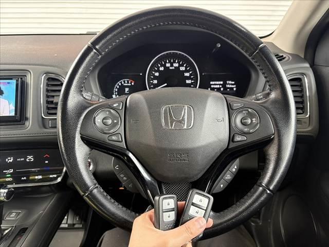 ヴェゼル X・ホンダセンシング 車検整備付 禁煙車 中期 フルセグナビ Bカメラ ETC BT ステリモ Aライト LED 横滑防止 革巻きステア 電動パーキング Aストップ スマキー 電格ミラー シートリフタ 純正16インチAW(7枚目)