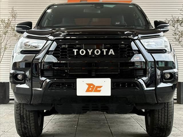 ハイラックス Z GRスポーツ 車検整備付 禁煙 後期 ベッドライナー リフトアップ トノカバー 純正8型DAナビ パノラミックモニター 純正18インチAW バグガード レーダークルーズ プリクラッシュS パワーシート ハーフレザー(9枚目)