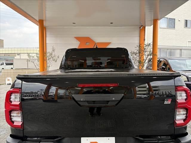 ハイラックス Z GRスポーツ 車検整備付 禁煙 後期 ベッドライナー リフトアップ トノカバー 純正8型DAナビ パノラミックモニター 純正18インチAW バグガード レーダークルーズ プリクラッシュS パワーシート ハーフレザー(20枚目)