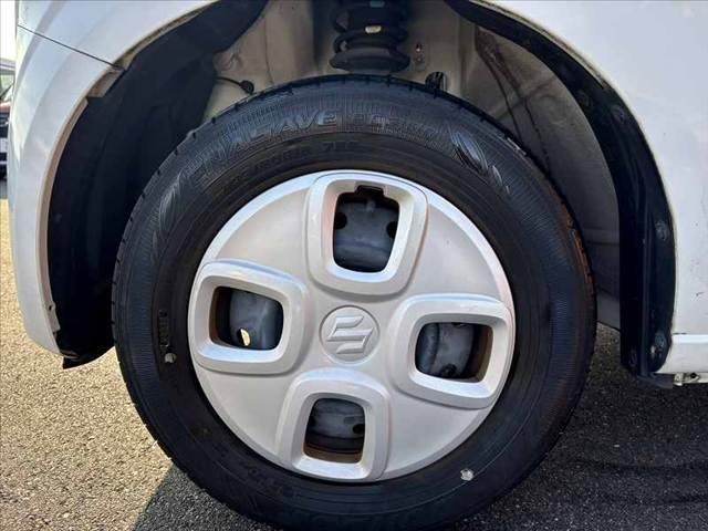 アルト F 禁煙 車検整備付き 純正オーディオ キーレス スペアキー マニュアルエアコン ACソケット フロアマット ドアバイザー SRSエアバッグ ふらつき防止 ヘッドライトレベライザー 純正ホイールキャップ(30枚目)