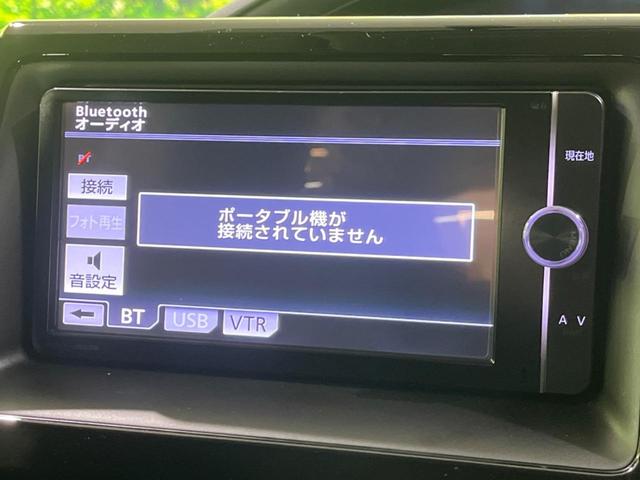 ヴォクシー ＺＳ　純正ナビ　バックカメラ　両側パワスラ　アイドリングストップ　ＬＥＤヘッド　フォグランプ　スマートキー　フルセグＴＶ　ＥＴＣ　電動格納ミラー　オートライト　オートエアコン　純正革巻きステアリング（24枚目）