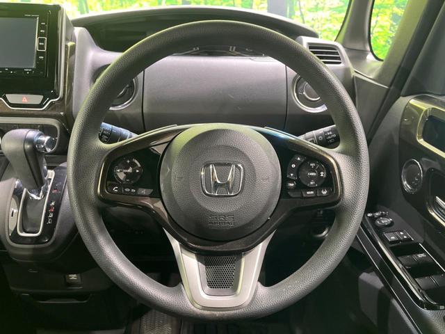 Ｎ－ＢＯＸカスタム Ｇ・Ｌホンダセンシング　禁煙車　ホンダセンシング　純正ナビ　バックカメラ　レーダークルーズ　ＥＴＣ　Ｂｌｕｅｔｏｏｔｈ再生　電動ドア　ＬＥＤヘッド　レーンキープ　スマートキー　純正１４インチアルミ　ロールサンシェード（11枚目）