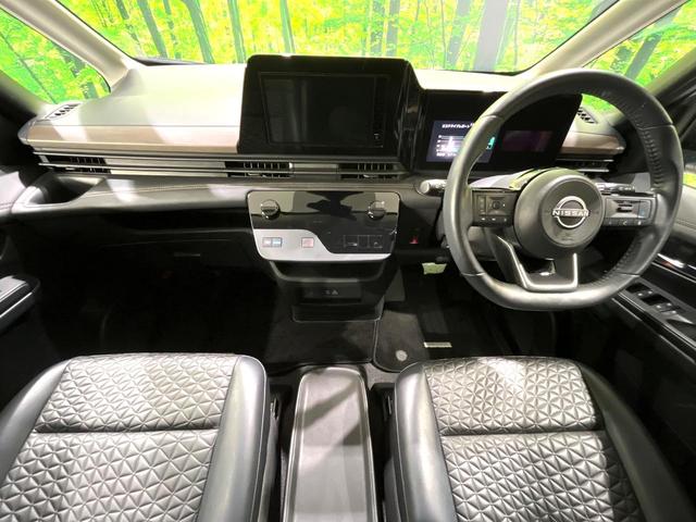 セレナ ｅ－パワー　ハイウェイスターＶ　禁煙車　プロパイロット　純正９型ナビ　フリップダウンモニター　両側電動スライドドア　全周囲カメラ　デジタルインナーミラー　ブラインドスポットモニター　ＬＥＤヘッド／フォグ　ＥＴＣ　ロールサンシェード（2枚目）