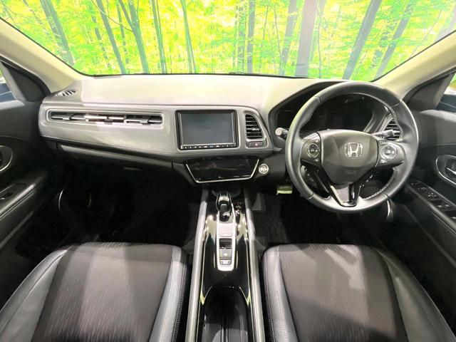 ヴェゼル ハイブリッドZ・ホンダセンシング 禁煙車 純正8型ナビ バックカメラ レーダークルーズ LEDヘッドライト シートヒーター コーナーセンサー ハーフレザーシート 革巻きステアリング 純正17インチアルミ パドルシフト オートライト(2枚目)
