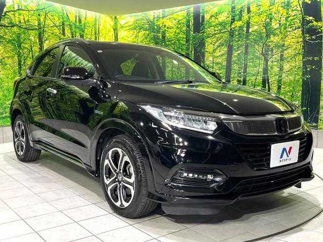 ヴェゼル ハイブリッドZ・ホンダセンシング 禁煙車 純正8型ナビ バックカメラ レーダークルーズ LEDヘッドライト シートヒーター コーナーセンサー ハーフレザーシート 革巻きステアリング 純正17インチアルミ パドルシフト オートライト(16枚目)