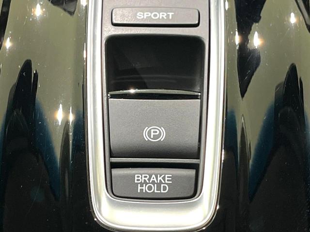 ヴェゼル ハイブリッドZ・ホンダセンシング 禁煙車 純正8型ナビ バックカメラ レーダークルーズ LEDヘッドライト シートヒーター コーナーセンサー ハーフレザーシート 革巻きステアリング 純正17インチアルミ パドルシフト オートライト(23枚目)