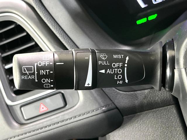 ヴェゼル ハイブリッドZ・ホンダセンシング 禁煙車 純正8型ナビ バックカメラ レーダークルーズ LEDヘッドライト シートヒーター コーナーセンサー ハーフレザーシート 革巻きステアリング 純正17インチアルミ パドルシフト オートライト(38枚目)