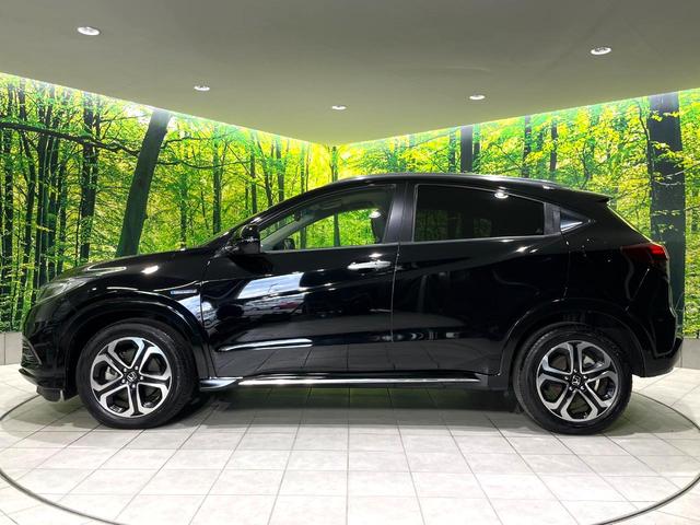 ヴェゼル ハイブリッドZ・ホンダセンシング 禁煙車 純正8型ナビ バックカメラ レーダークルーズ LEDヘッドライト シートヒーター コーナーセンサー ハーフレザーシート 革巻きステアリング 純正17インチアルミ パドルシフト オートライト(56枚目)