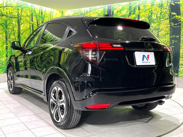 ヴェゼル ハイブリッドZ・ホンダセンシング 禁煙車 純正8型ナビ バックカメラ レーダークルーズ LEDヘッドライト シートヒーター コーナーセンサー ハーフレザーシート 革巻きステアリング 純正17インチアルミ パドルシフト オートライト(57枚目)