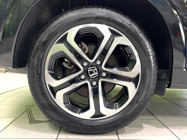 ヴェゼル ハイブリッドZ・ホンダセンシング 禁煙車 純正8型ナビ バックカメラ レーダークルーズ LEDヘッドライト シートヒーター コーナーセンサー ハーフレザーシート 革巻きステアリング 純正17インチアルミ パドルシフト オートライト(59枚目)