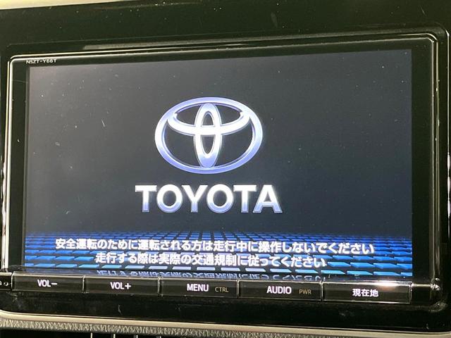 エスクァイア ハイブリッドGi プレミアムパッケージ 禁煙車 純正9型ナビ フリップダウンモニター 両側電動スライドドア セーフティセンス バックカメラ シートヒーター LEDヘッドライト クルーズコントロール ステアリングヒーター オートハイビーム(4枚目)