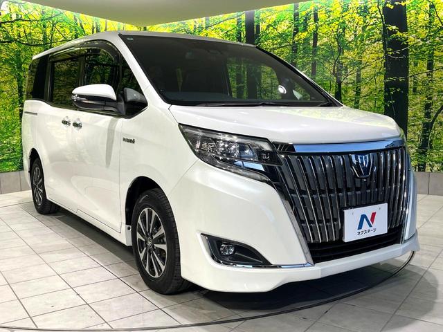 エスクァイア ハイブリッドGi プレミアムパッケージ 禁煙車 純正9型ナビ フリップダウンモニター 両側電動スライドドア セーフティセンス バックカメラ シートヒーター LEDヘッドライト クルーズコントロール ステアリングヒーター オートハイビーム(16枚目)