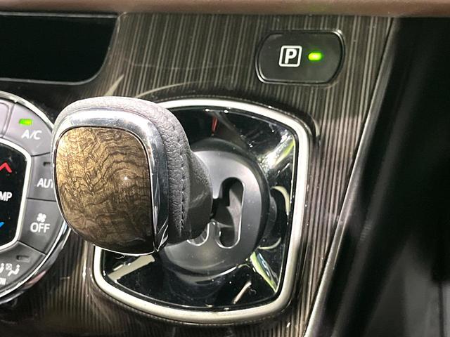 エスクァイア ハイブリッドGi プレミアムパッケージ 禁煙車 純正9型ナビ フリップダウンモニター 両側電動スライドドア セーフティセンス バックカメラ シートヒーター LEDヘッドライト クルーズコントロール ステアリングヒーター オートハイビーム(24枚目)