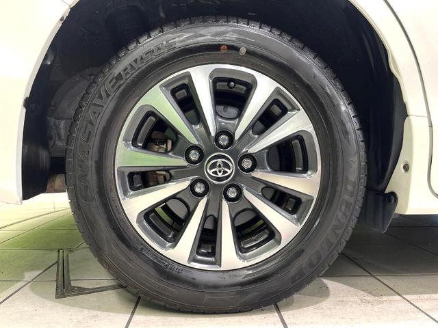 エスクァイア ハイブリッドGi プレミアムパッケージ 禁煙車 純正9型ナビ フリップダウンモニター 両側電動スライドドア セーフティセンス バックカメラ シートヒーター LEDヘッドライト クルーズコントロール ステアリングヒーター オートハイビーム(64枚目)