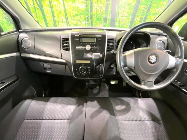 ワゴンＲスティングレー Ｘ　禁煙車　スマートキー　ＨＩＤヘッド　オートエアコン　１４インチアルミ　革巻きステアリング　ＣＤ再生　フォグライト　電動格納ミラー　プライバシーガラス　アームレスト　シートアンダーボックス（2枚目）