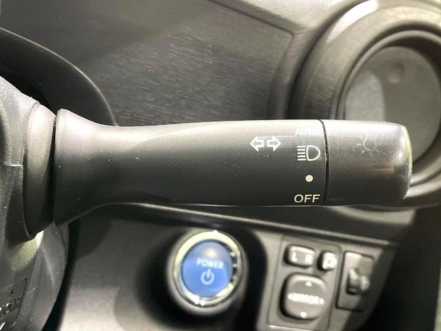 アクア S 禁煙車 純正ナビ バックカメラ スマートキー オートライト オートエアコン Bluetooth再生 電動格納ミラー ステアリングスイッチ ウインカーミラー 盗難防止装置(6枚目)