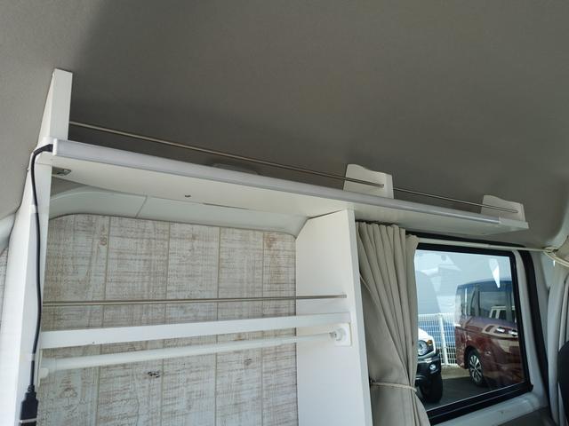 ＮＶ１００クリッパーバン ＤＸ　ＧＬパッケージ　キャンピング仕様車　シンク　ベッドキット　ポータブル電源　ソーラーパネル　リフトアップ　ＸＴＲＥＭＥ－Ｊ１４ＡＷ　マッドタイヤ　ナビＴＶ　２カメラドラレコ　ＥＴＣ　黒革調シートカバー（16枚目）