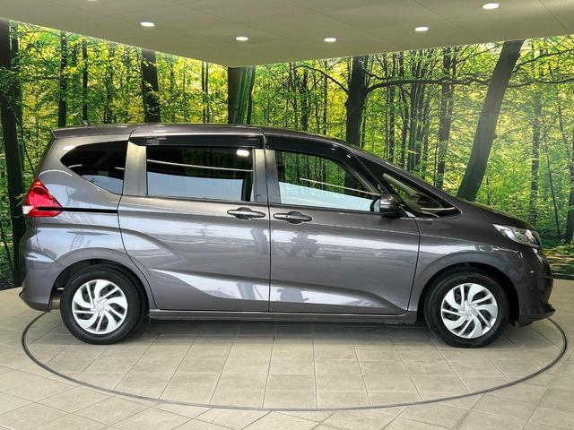 フリード Ｇ・ホンダセンシング　両側電動ドア　衝突被害軽減システム　禁煙車　ＳＤナビ　アダプティブクルーズ　バックカメラ　ビルトインＥＴＣ　フルセグ　ドラレコ　後席モニター　スマートキー　車線逸脱警報　オートライト　オートエアコン（25枚目）