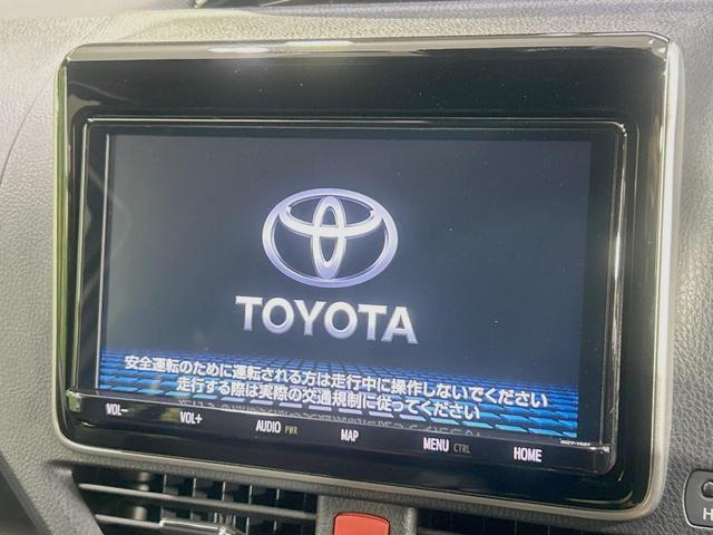 ノア ハイブリッドＳｉ　ダブルバイビーＩＩＩ　禁煙車　純正９インチナビ　後席モニター　セーフティセンス　両側パワースライドドア　クルコン　バックカメラ　ＥＴＣ２．０　ドラレコ　デュアルエアコン　ＬＥＤヘッドライト　１６インチアルミホイール（6枚目）