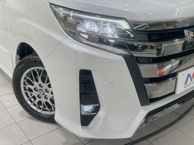 ノア ハイブリッドＳｉ　ダブルバイビーＩＩＩ　禁煙車　純正９インチナビ　後席モニター　セーフティセンス　両側パワースライドドア　クルコン　バックカメラ　ＥＴＣ２．０　ドラレコ　デュアルエアコン　ＬＥＤヘッドライト　１６インチアルミホイール（13枚目）