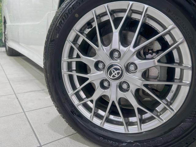 ノア ハイブリッドＳｉ　ダブルバイビーＩＩＩ　禁煙車　純正９インチナビ　後席モニター　セーフティセンス　両側パワースライドドア　クルコン　バックカメラ　ＥＴＣ２．０　ドラレコ　デュアルエアコン　ＬＥＤヘッドライト　１６インチアルミホイール（14枚目）
