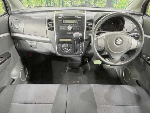 ワゴンRスティングレー X 禁煙車 スマートキー HIDヘッド フォグランプ オートエアコン 純正14インチアルミ CD 革巻きステアリング シートリフター バニティミラー 電動格納ミラー チルトステアリング イモビライザー(2枚目)